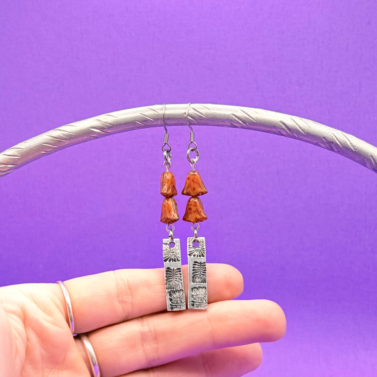 Hand Stamped Dangle Earrings Silver Floral Czech Orange Beads