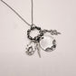 Silver Hand Stamped Charm Necklace Snake Lightning Lock