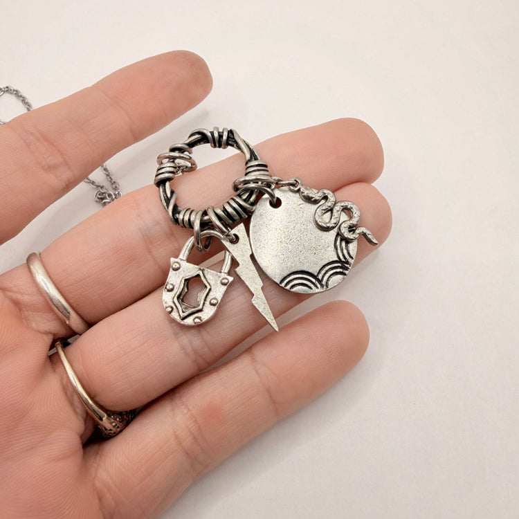 Silver Hand Stamped Charm Necklace Snake Lightning Lock
